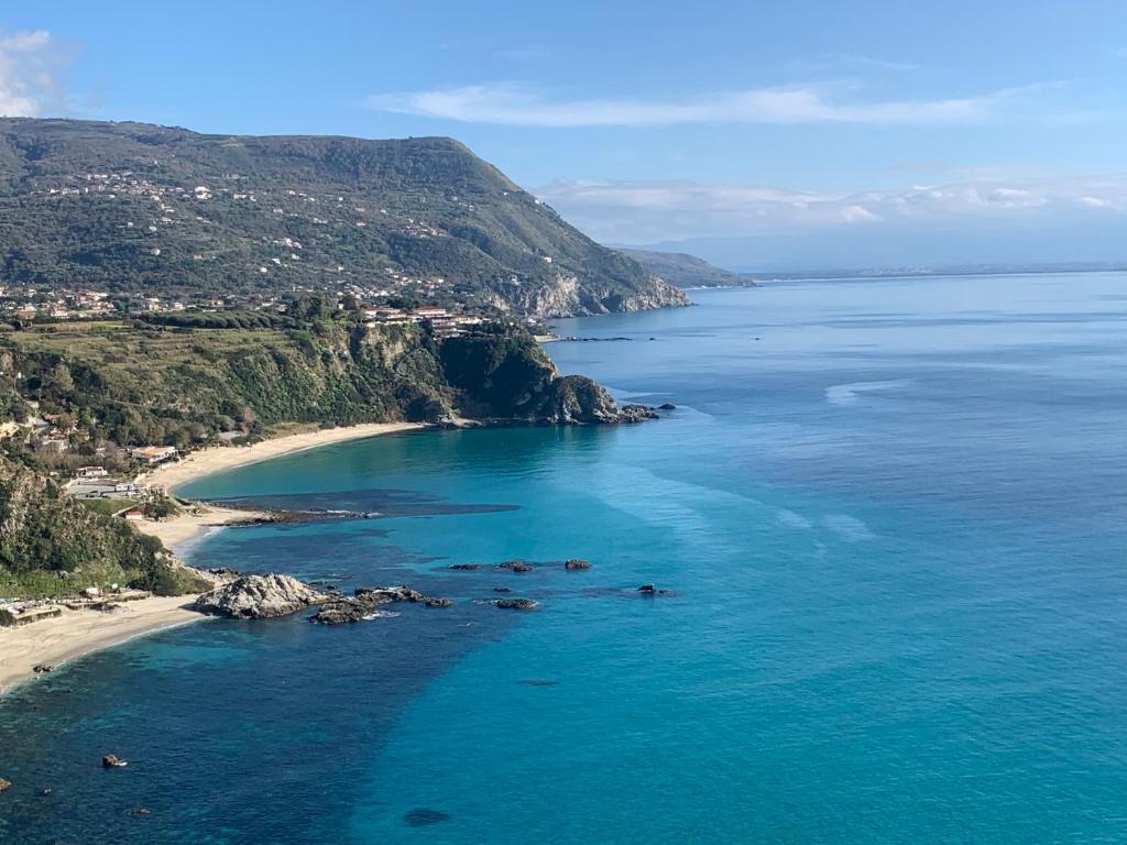 an aerial view of a beach next to the ocean at Miriasol Bed and Breakfast in Capo Vaticano