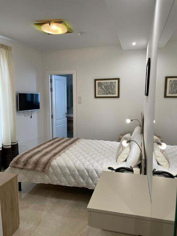 Postel nebo postele na pokoji v ubytování La Reggia Seaview Guesthouse