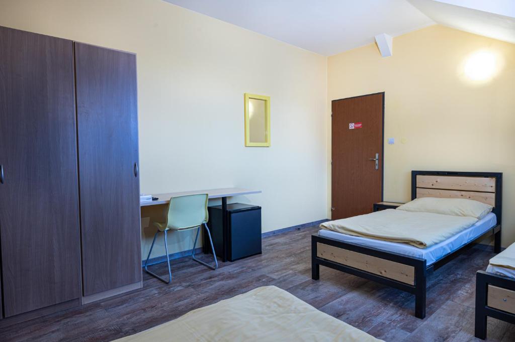 Postel nebo postele na pokoji v ubytování Inter hostel Liberec