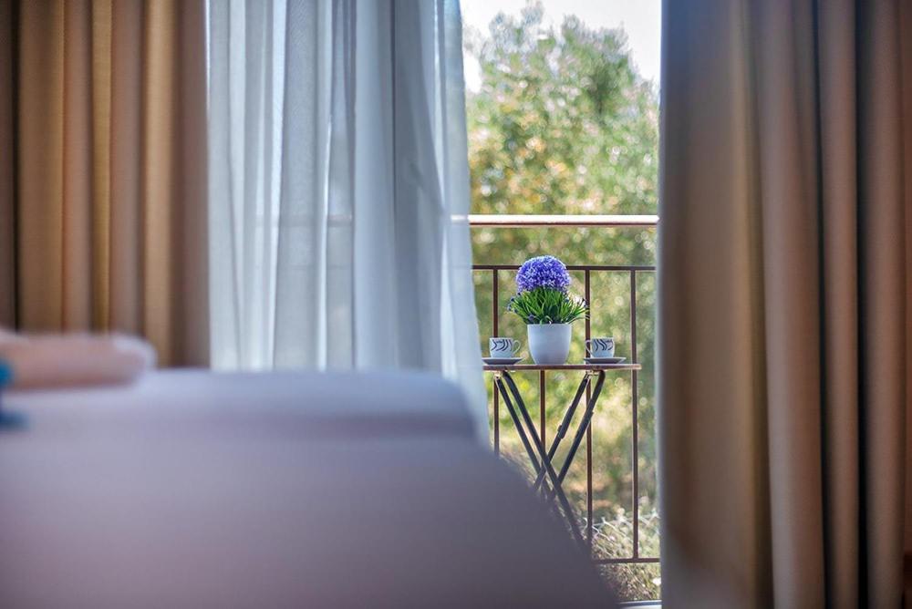 Postel nebo postele na pokoji v ubytování Valery Apartments
