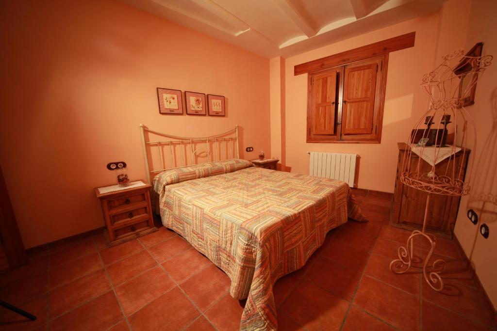Postel nebo postele na pokoji v ubytování Casa Rural Rosa