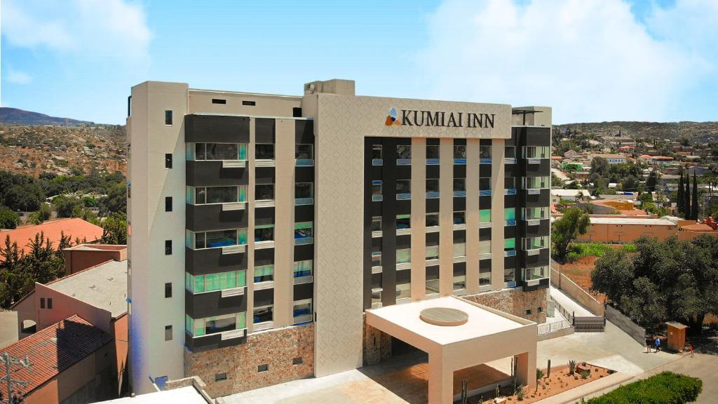 a building with a sign on top of it at Hotel Kumiai Inn in Tecate