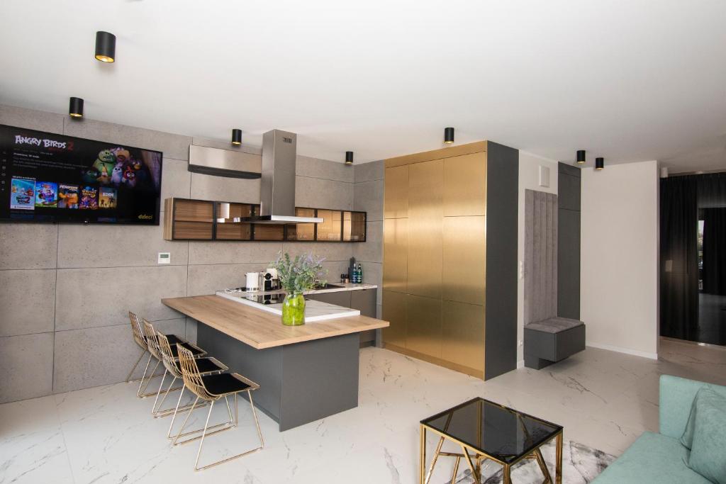 Kuchyň nebo kuchyňský kout v ubytování EL Apartments - Aries