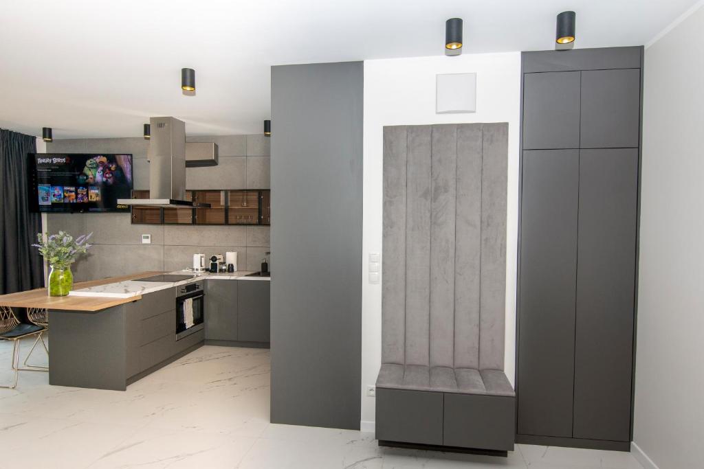 Kuchyň nebo kuchyňský kout v ubytování EL Apartments - Aries