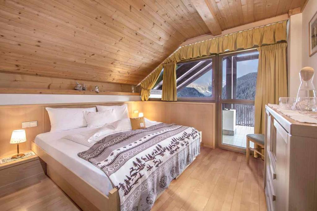 Ένα ή περισσότερα κρεβάτια σε δωμάτιο στο Residence Villa al Sole