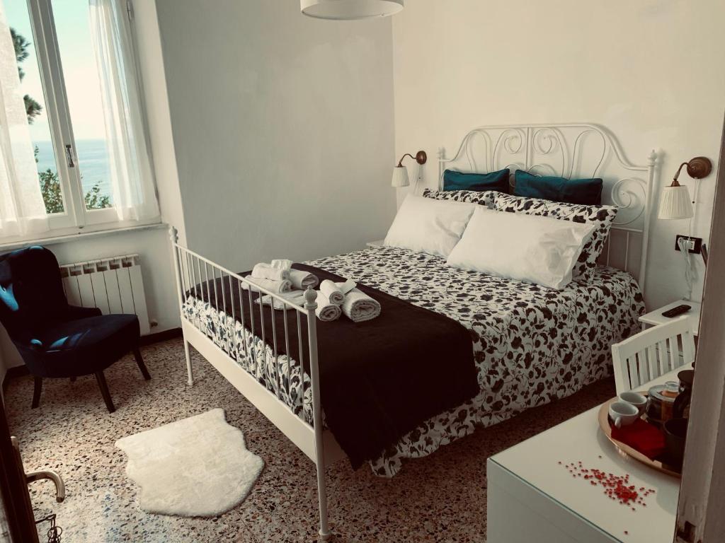 Łóżko lub łóżka w pokoju w obiekcie Corniglia Dreams