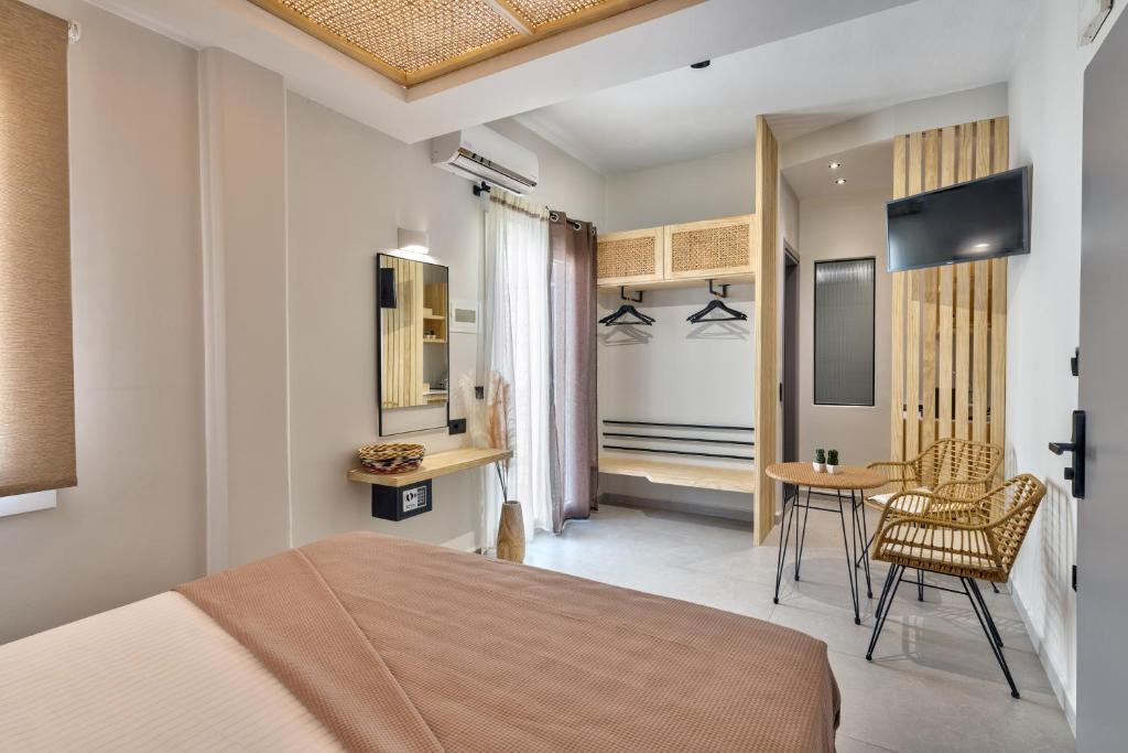 Rúm í herbergi á Aeolia Boutique Studios