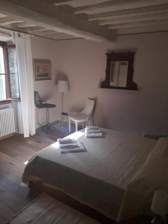 Łóżko lub łóżka w pokoju w obiekcie B&B la casa di fuori porta