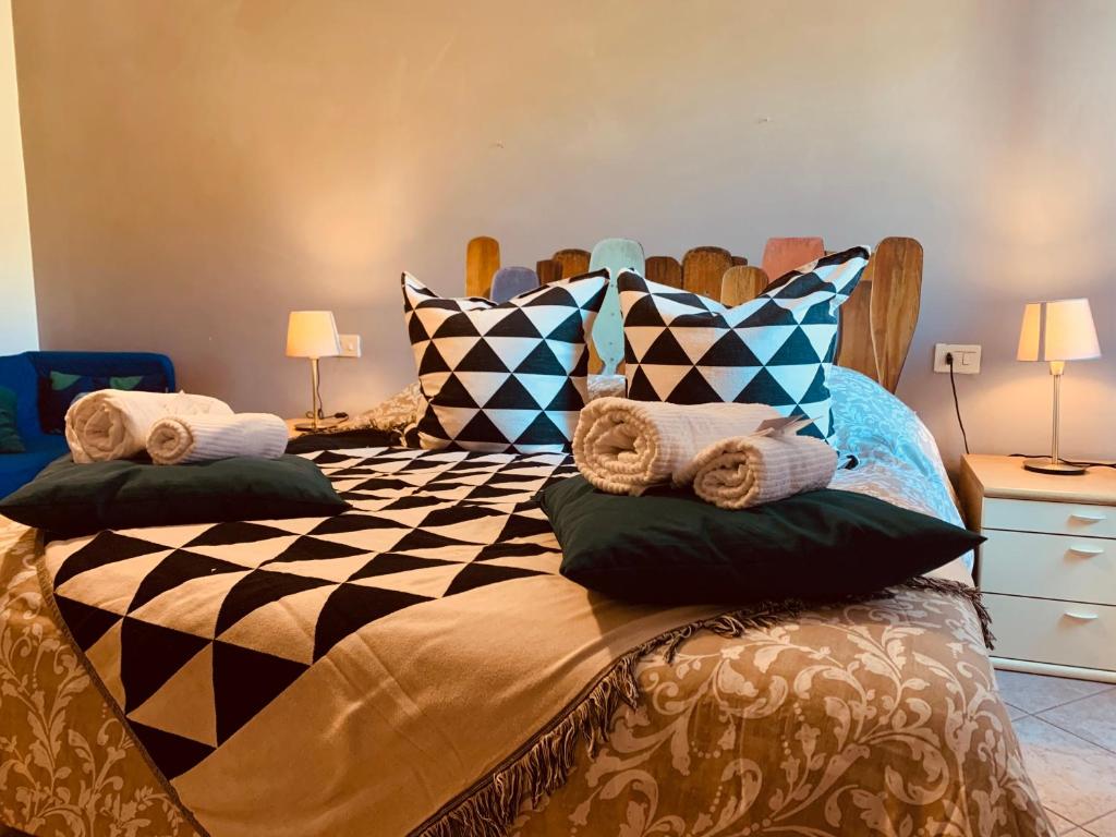Posteľ alebo postele v izbe v ubytovaní Casa Batella