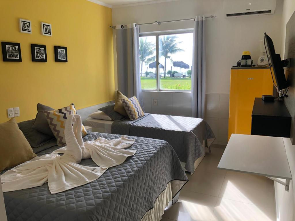  STUDIO PÉ NA AREIA VISTA AO MAR