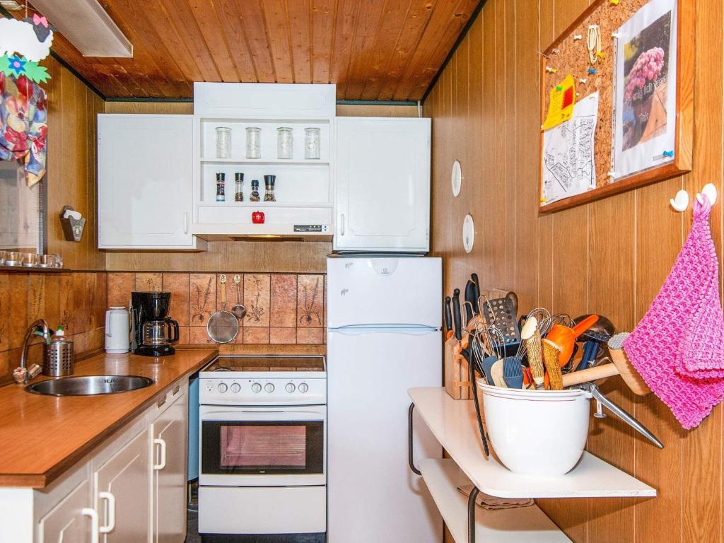 Kuchyň nebo kuchyňský kout v ubytování Holiday home Toftlund XV