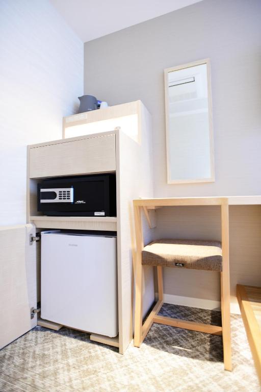 Kuchyň nebo kuchyňský kout v ubytování IAM HOTEL