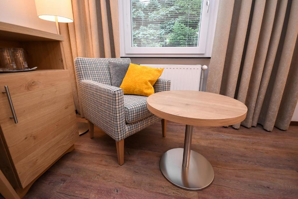 Area soggiorno di Seegasthof Hois'n Wirt - Hotel mit Wellnessbereich