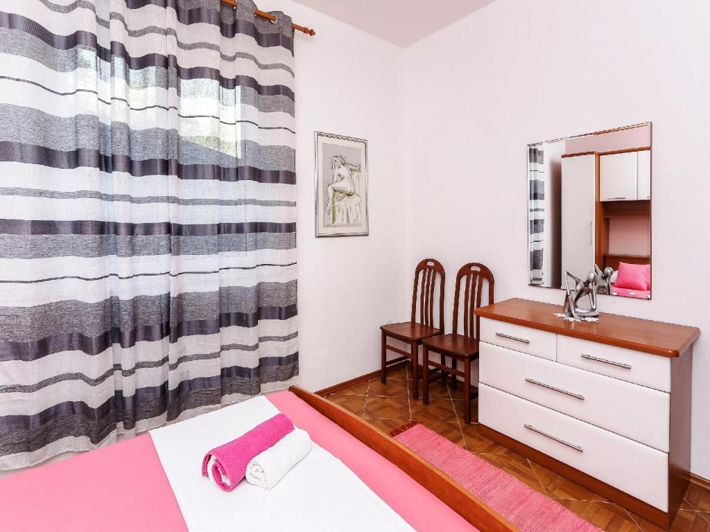 Postel nebo postele na pokoji v ubytování Villa Lina