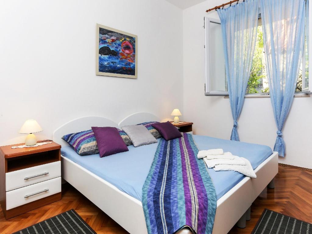 Postel nebo postele na pokoji v ubytování Villa Lina