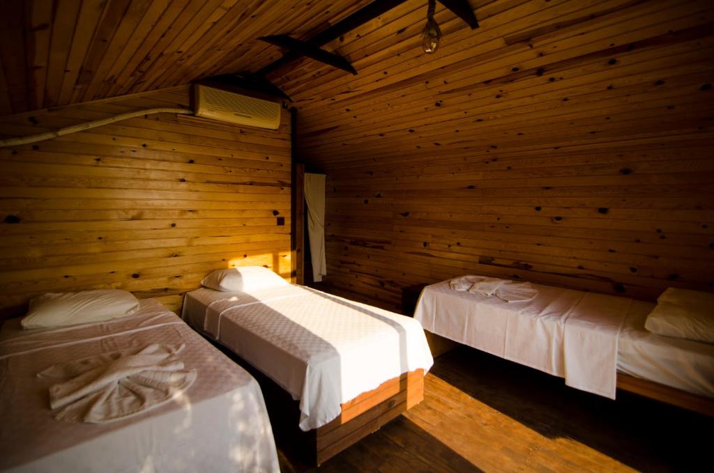 Postel nebo postele na pokoji v ubytování Kasaba Butik Otel