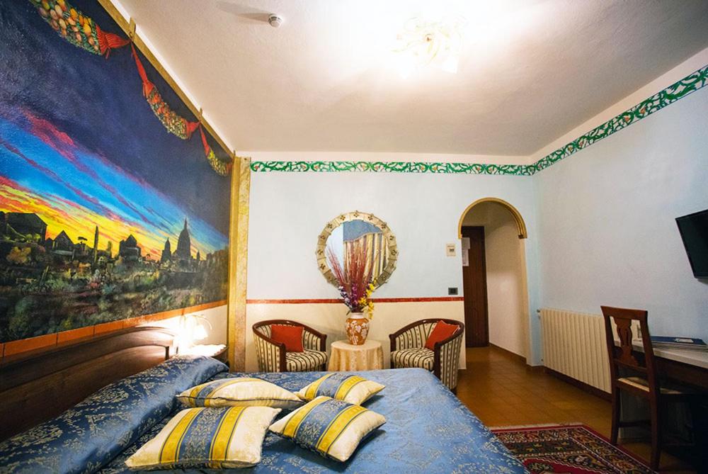 Postel nebo postele na pokoji v ubytování Albergo Ristorante Belvedere