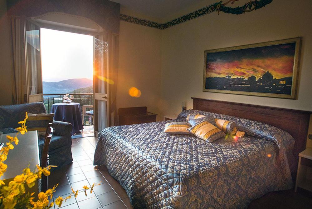 Postel nebo postele na pokoji v ubytování Albergo Ristorante Belvedere