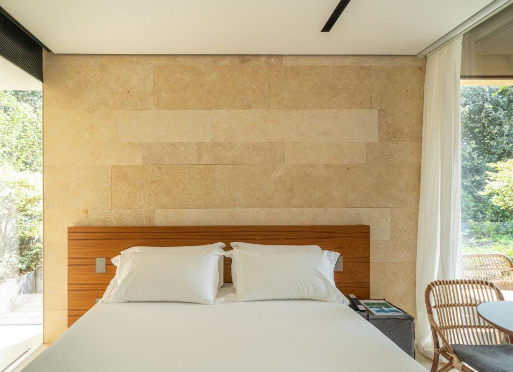 Postel nebo postele na pokoji v ubytování C-Hotel & Spa