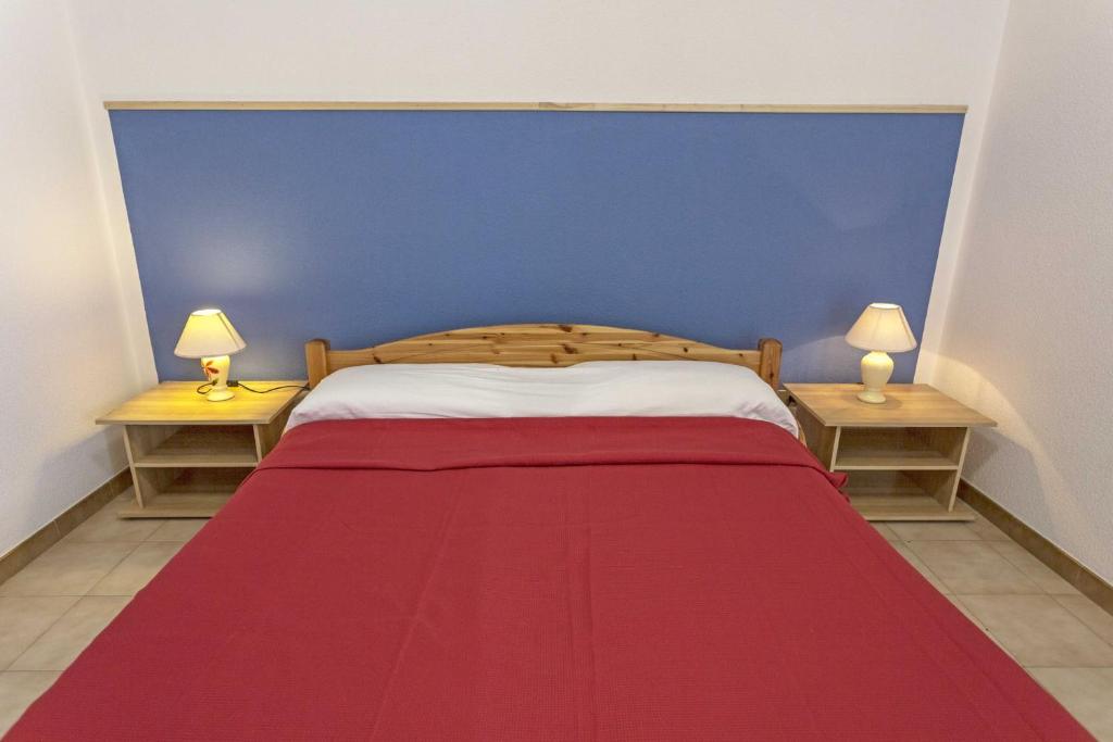 Postel nebo postele na pokoji v ubytování Gallipoli a due passi Residence