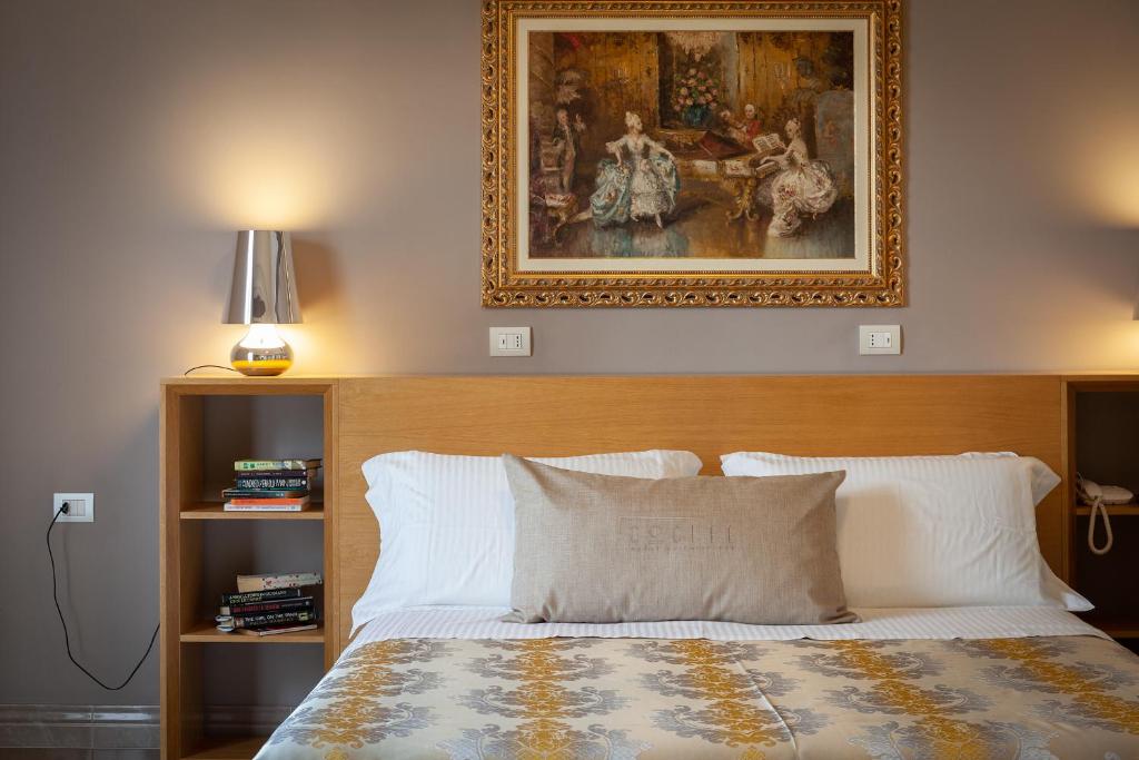 Posteľ alebo postele v izbe v ubytovaní Coclee Suite Palace