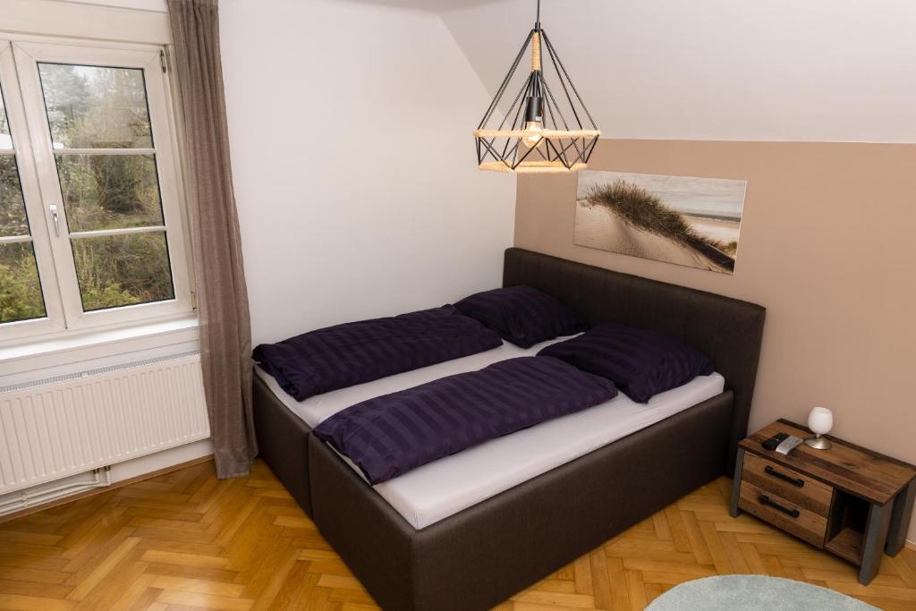 Postel nebo postele na pokoji v ubytování L&P Appartement Klagenfurt