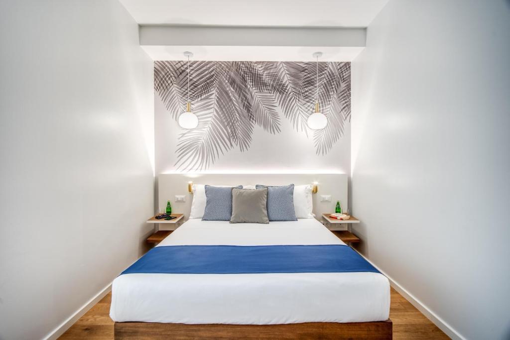 Posteľ alebo postele v izbe v ubytovaní Victor Boutique Hotel