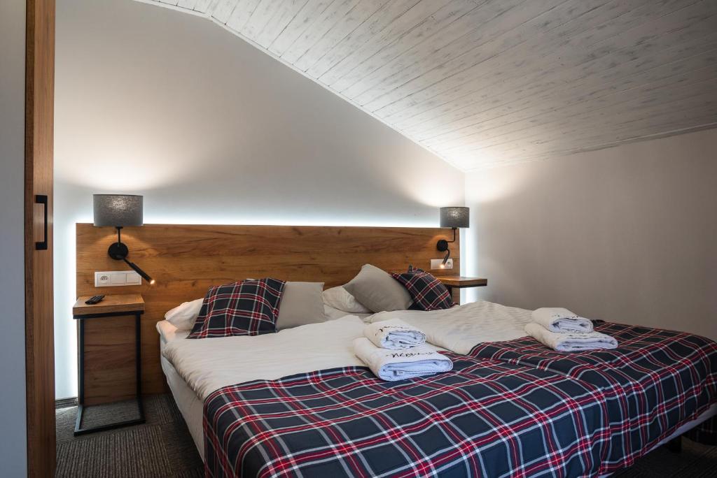 Posteľ alebo postele v izbe v ubytovaní Nowa - Ski SPA Hotel