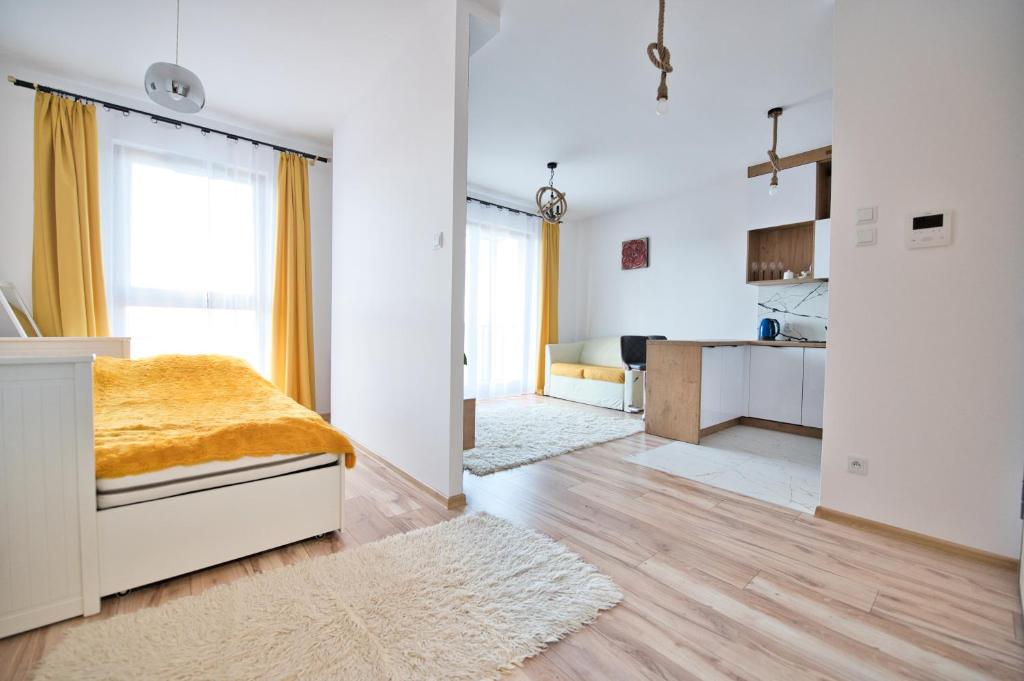 A bed or beds in a room at Apartament Miki-Gdańsk Wrzeszcz/Brzeźno-Plaża 2 km