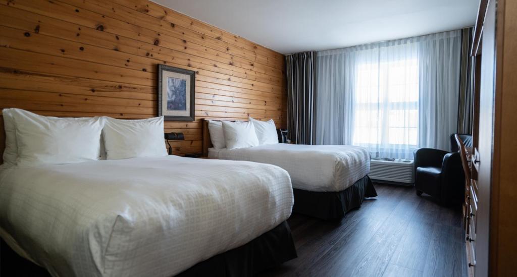 Postel nebo postele na pokoji v ubytování Hôtel Le Francis