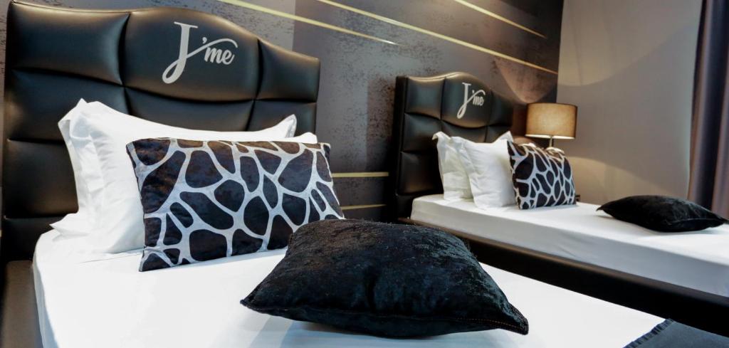 Postel nebo postele na pokoji v ubytování J'Me Boutique Hotel - Adults only