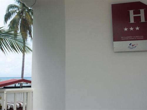 Certifikát, hodnocení, plakát nebo jiný dokument vystavený v ubytování Coco Beach Marie-Galante