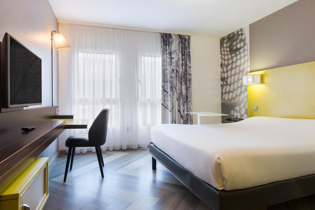 Postel nebo postele na pokoji v ubytování Ibis Styles Nice Centre Port
