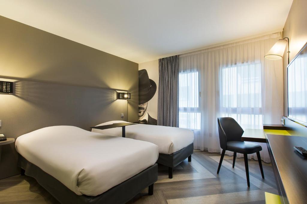 Postel nebo postele na pokoji v ubytování Ibis Styles Nice Centre Port