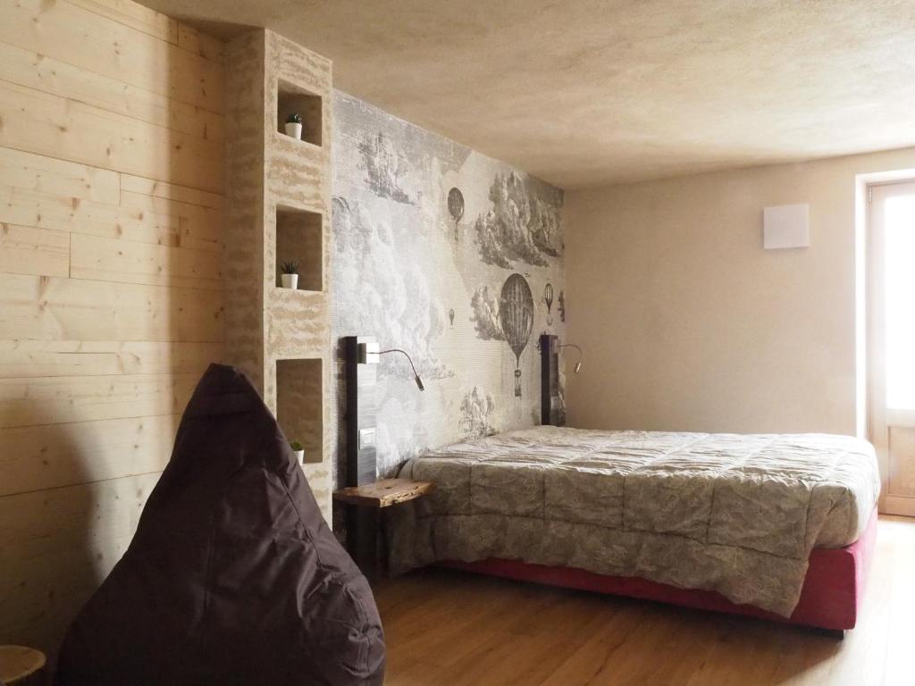 Cama o camas de una habitación en VIRASOL IN CITTÁ, camera NUVOLE