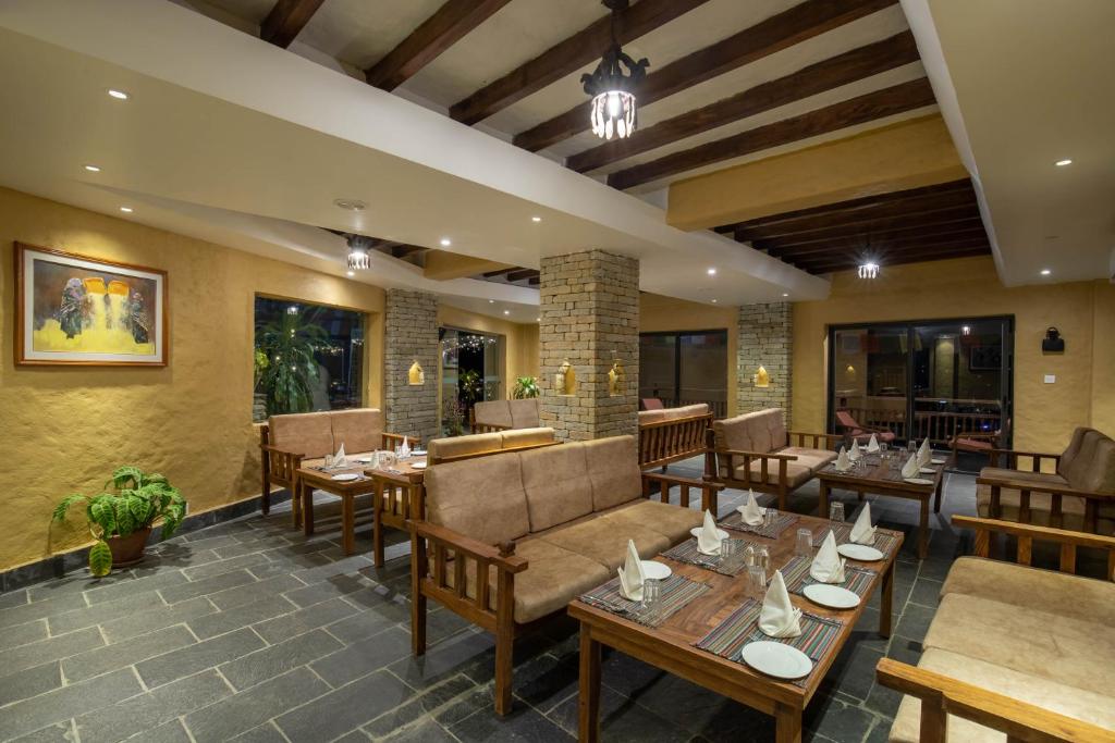 Restaurant o un lloc per menjar a Bar Peepal Resort