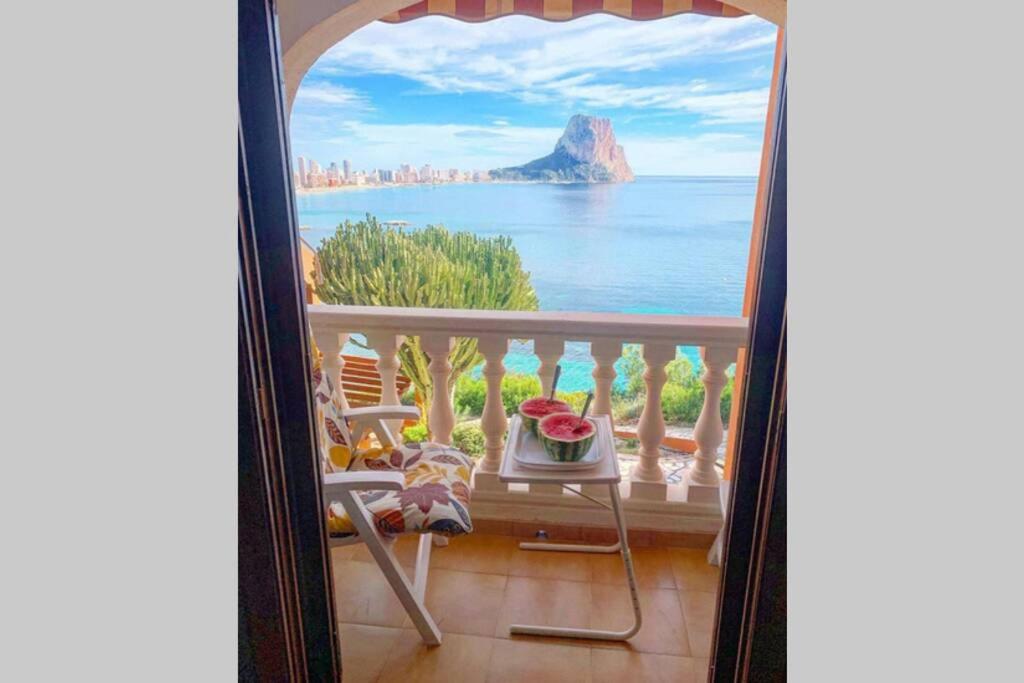 a balcony with a view of the ocean at Panoramic sea and Ifach views in Calpe in Calpe