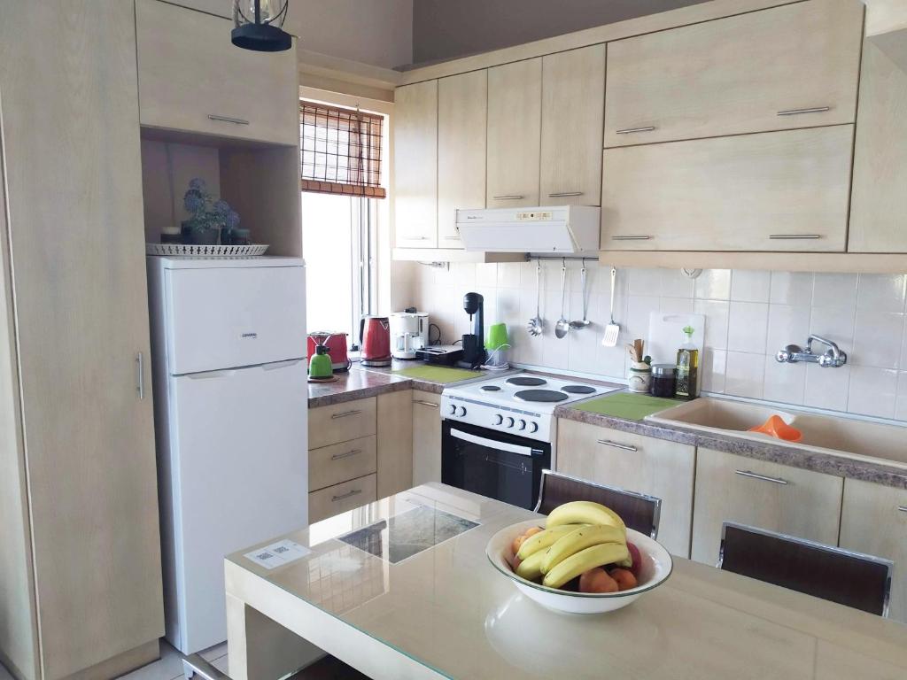 Kuchyň nebo kuchyňský kout v ubytování Amalias Place