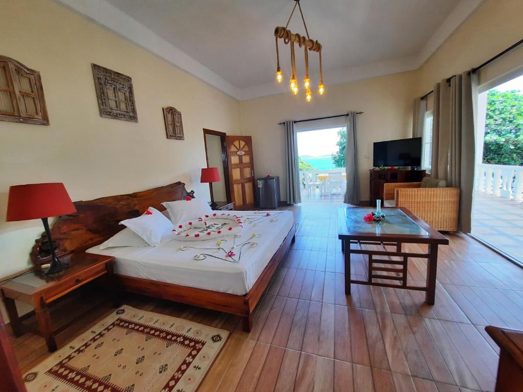 Postel nebo postele na pokoji v ubytování Villa Des Flots