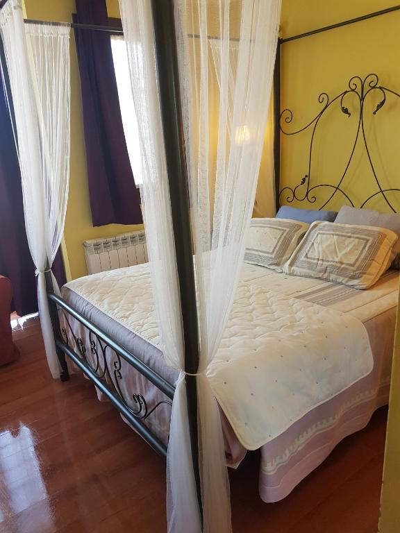 Postel nebo postele na pokoji v ubytování Hotel Virginia R.H.