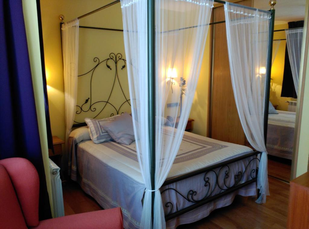 Postel nebo postele na pokoji v ubytování Hotel Virginia R.H.