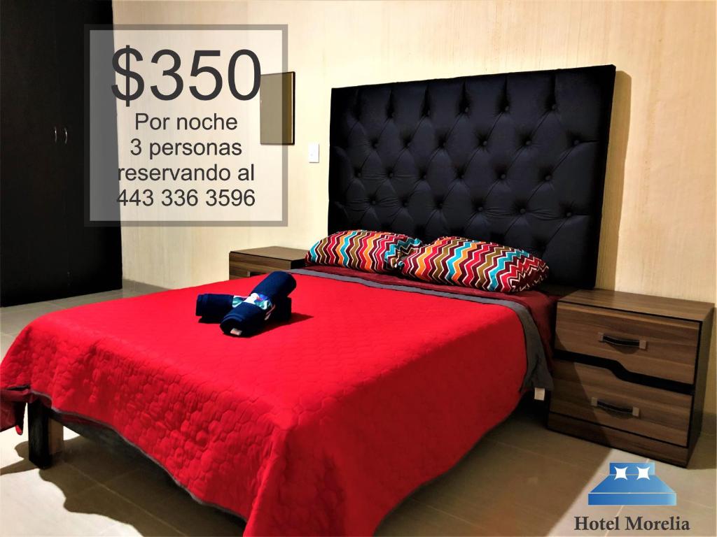 Postel nebo postele na pokoji v ubytování Hotel Morelia In