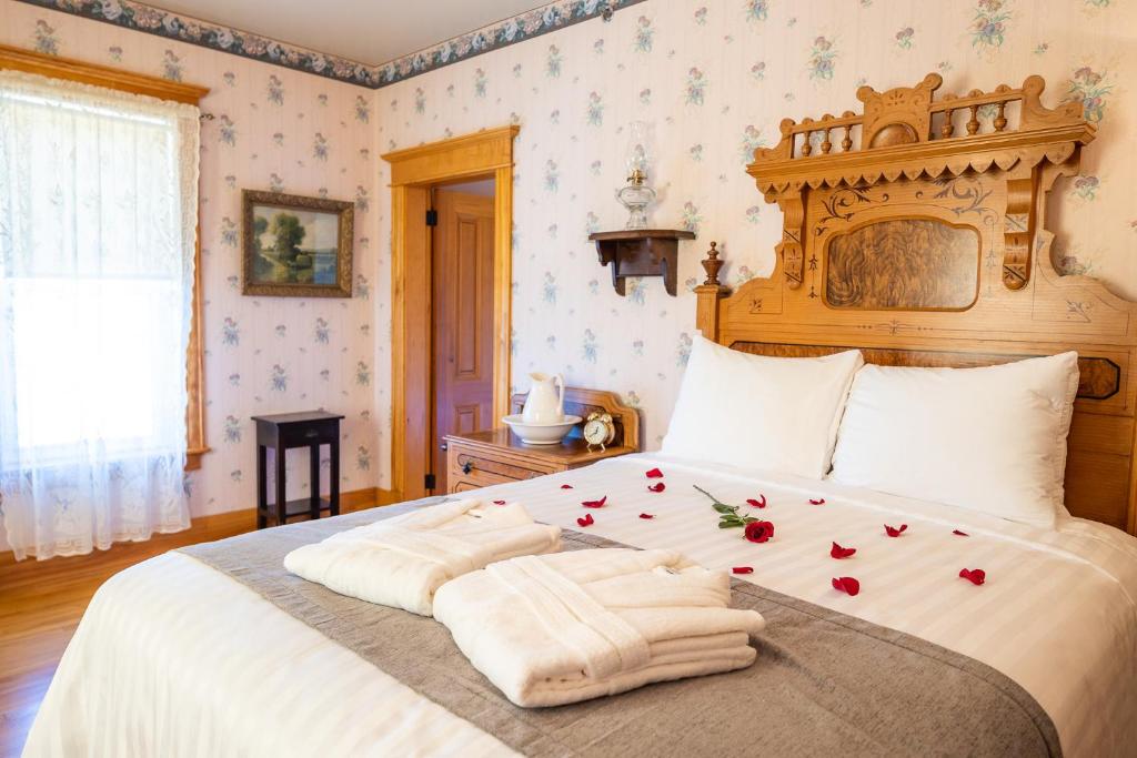 Postel nebo postele na pokoji v ubytování Hôtel Château Albert
