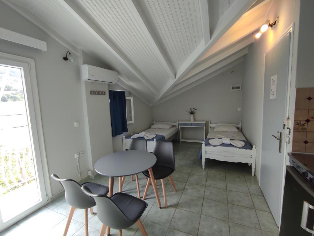 A bed or beds in a room at Venus Rooms
