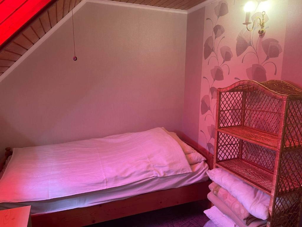 Postel nebo postele na pokoji v ubytování Iluska Vendégház
