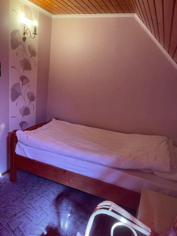 Postel nebo postele na pokoji v ubytování Iluska Vendégház