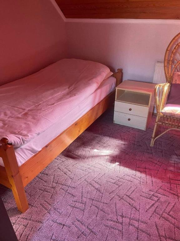 Postel nebo postele na pokoji v ubytování Iluska Vendégház