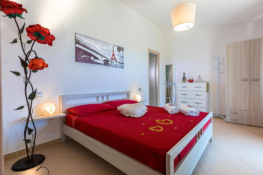 Łóżko lub łóżka w pokoju w obiekcie B&B IL TEMPONE