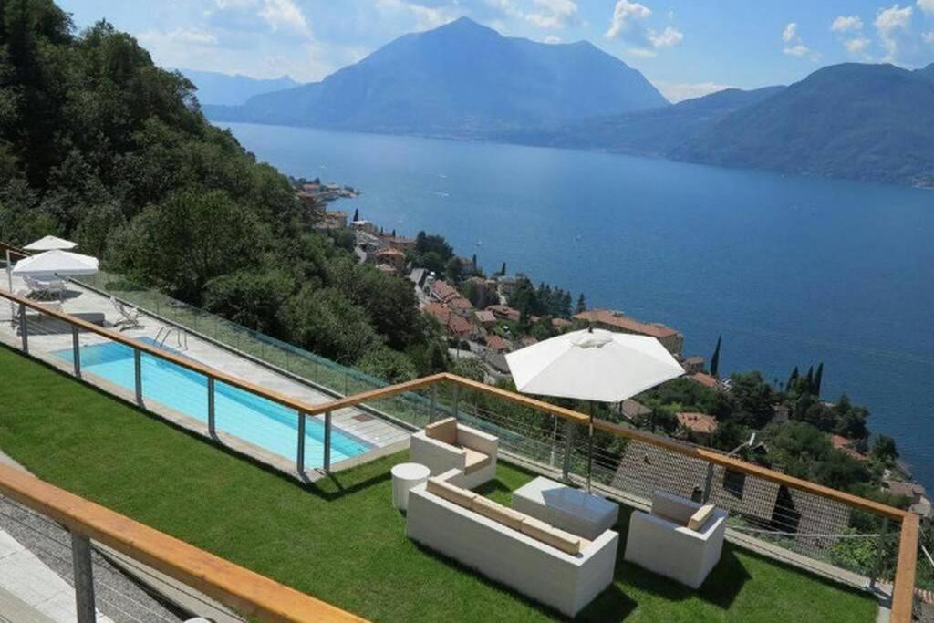 a house with a view of a body of water at Lavanda house - breathtaking view - in Bellano