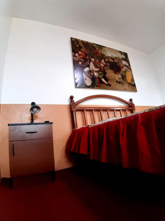 Postel nebo postele na pokoji v ubytování HOSPEDAJE CENTRAL